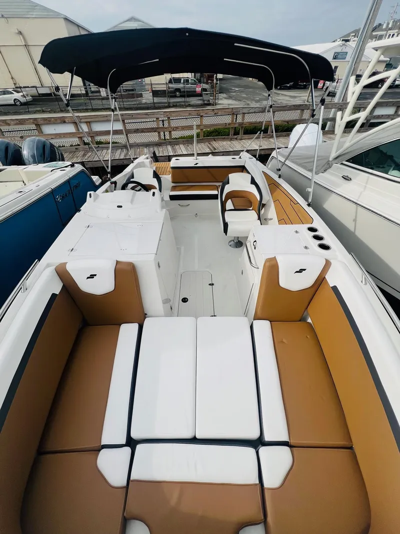 Slide: The Image of 2024 Starcraft SVX 231 OB DH boat with wood-look deck. - 26