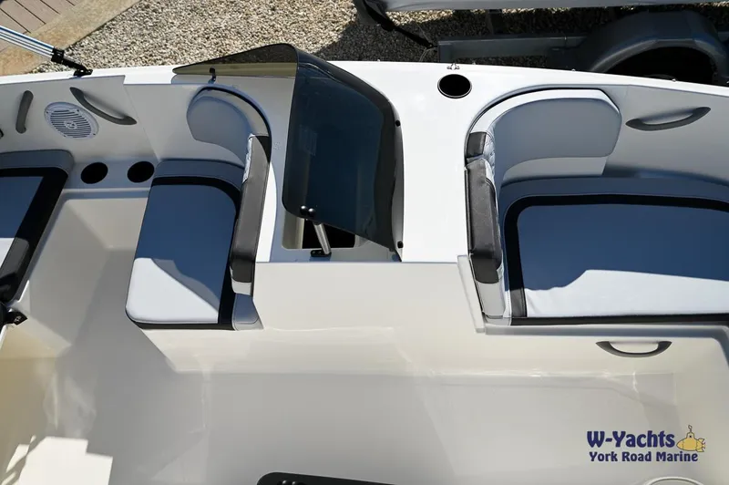 Slide: The Image of 2024 Bayliner M17 boat interior with seating and windshield. - 14