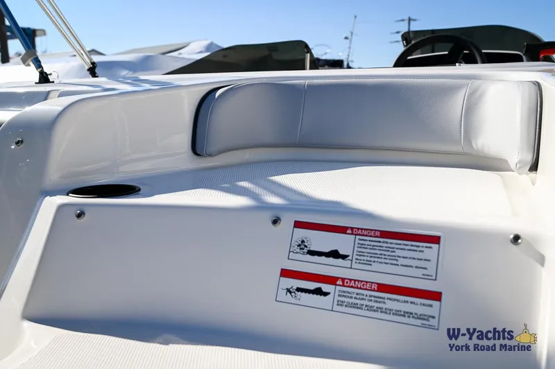 Slide: The Image of 2024 Bayliner M17 boat interior with safety warnings and York Road Marine logo. - 23