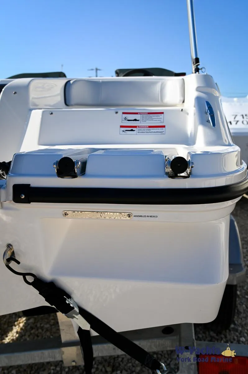 Slide: The Image of 2024 Bayliner M17 boat rear view with white exterior. - 24