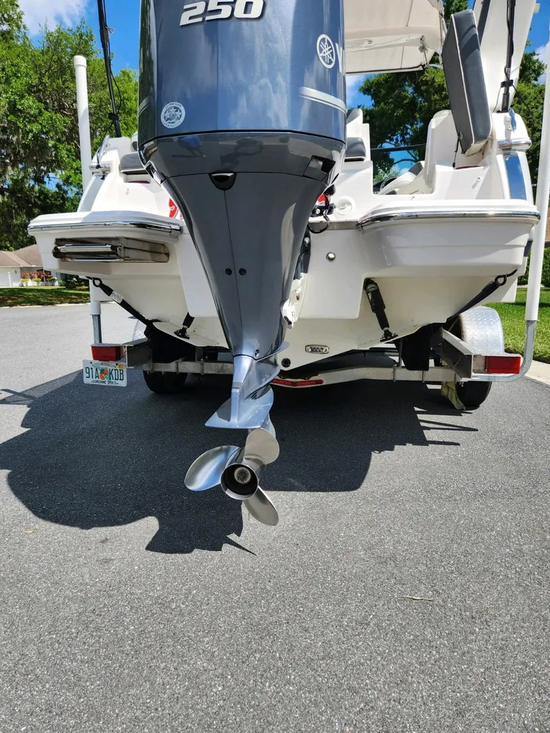 Slide: The Image of 2021 Regal 23 OBX boat with Yamaha 250 outboard motor. - 1