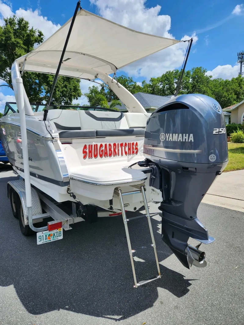 Slide: The Image of 2021 Regal 23 OBX boat with Yamaha 250 outboard motor on trailer. - 12