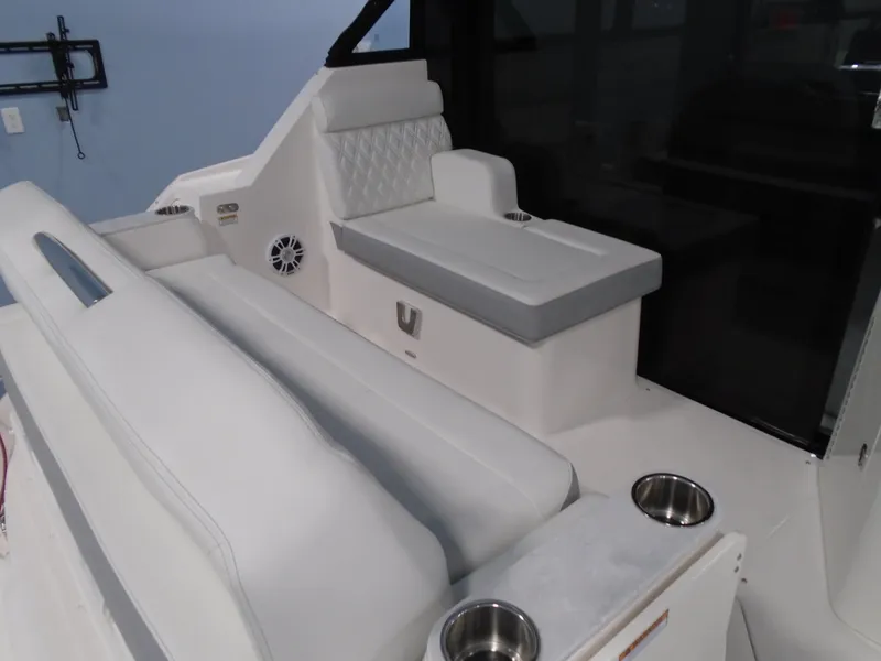 Slide: The Image of 2024 Regal 36 XO interior with white seating. - 10