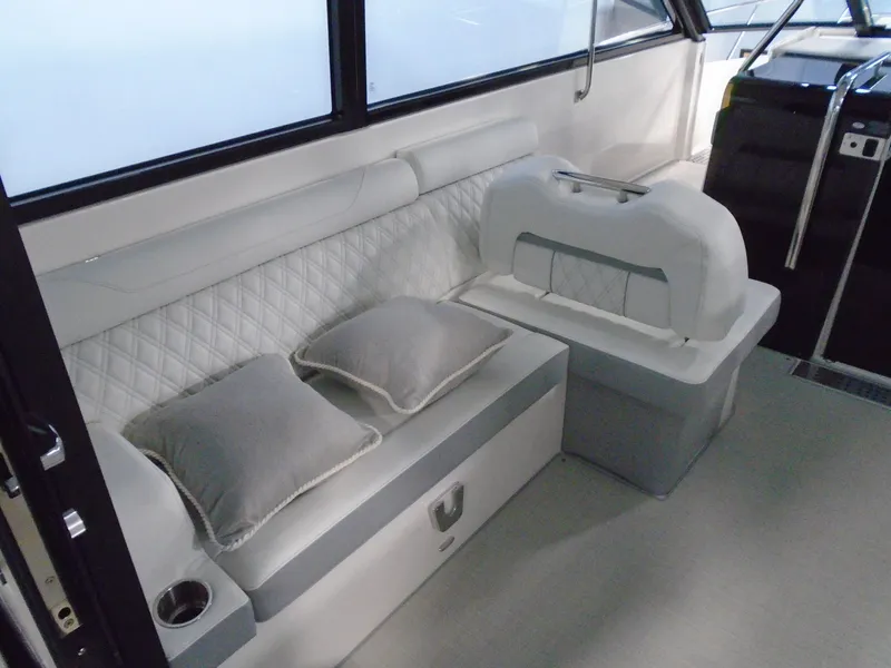 Slide: The Image of Interior of 2024 Regal 36 XO with elegant seating. - 12