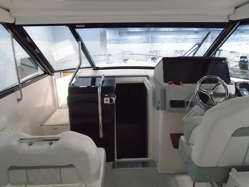 Slide: The Image of Interior of 2024 Regal 36 XO yacht cockpit. - 16