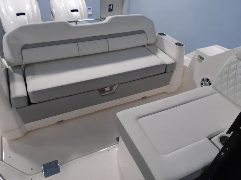 Slide: The Image of Interior of 2024 Regal 36 XO featuring luxurious seating. - 17