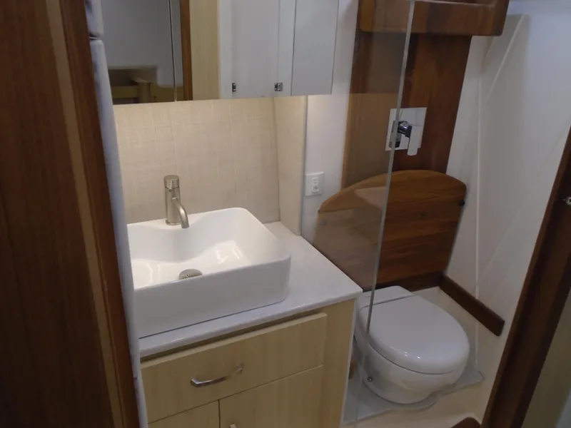 Slide: The Image of Luxurious bathroom in the 2024 Regal 36 XO boat. - 21