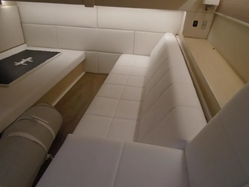 Slide: The Image of Interior of 2024 Regal 36 XO yacht with white upholstery. - 25