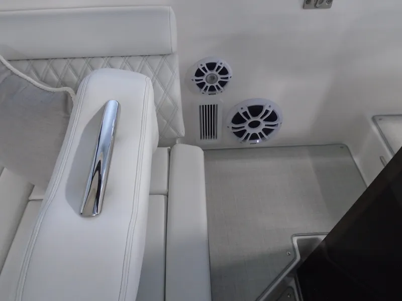 Slide: The Image of Interior of 2024 Regal 36 XO with speakers and upholstery. - 31