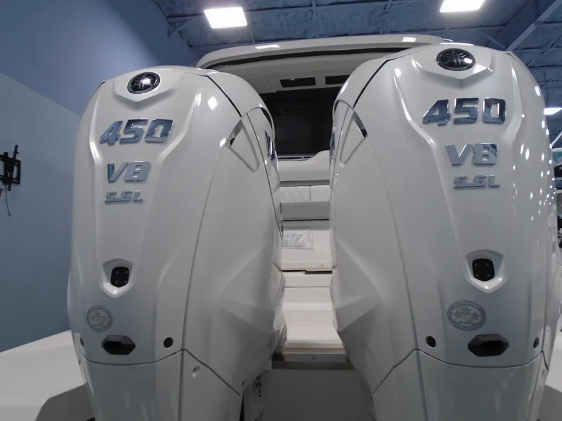 Slide: The Image of Two 450 HP V8 engines on a 2024 Regal 36 XO boat. - 5
