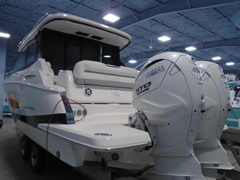 Slide: The Image of 2024 Regal 36 XO boat with Yamaha outboard engines. - 7
