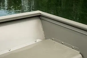 Slide: The Image of 2024 Lund 1448 boat interior with water in the background. - 5