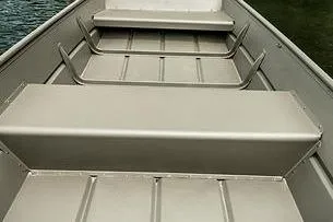 Slide: The Image of 2024 Lund 1448 boat on water with person steering, wearing a life jacket. - 7