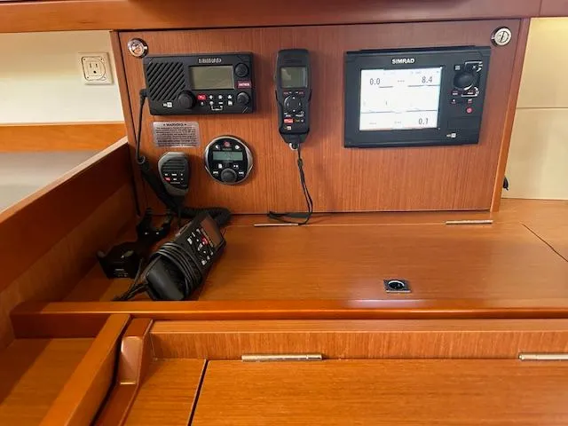 Slide: The Image of Interior of 2013 Beneteau 48 yacht with modern kitchen and dining area. - 17