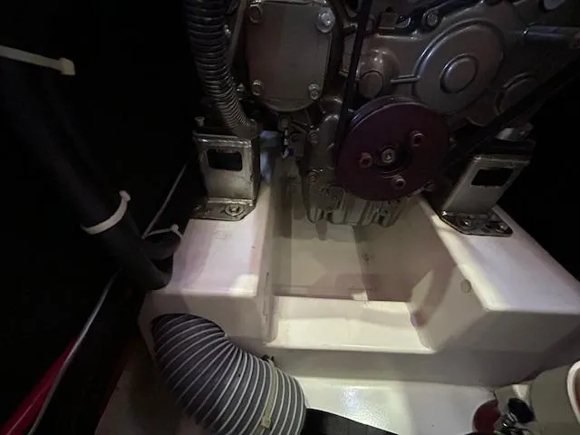 Slide: The Image of Covered cockpit area of a 2013 Beneteau 48 sailboat at a marina. - 44