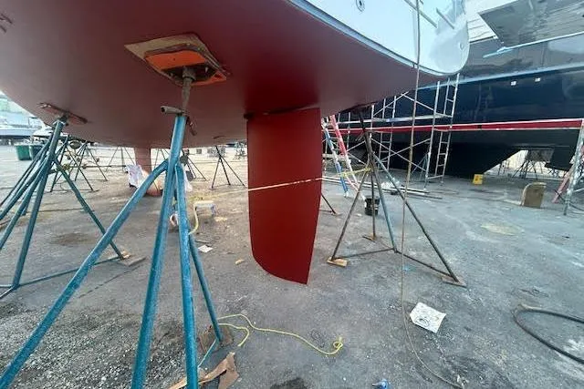 Slide: The Image of Beneteau Oceanis 48 sailboat keel in dry dock, 2013 model. - 50