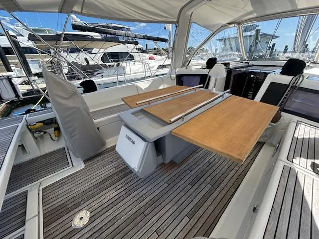 Slide: The Image of Beneteau 48 sailboat deck, 2013 model, showing electrical connections and teak flooring. - 8