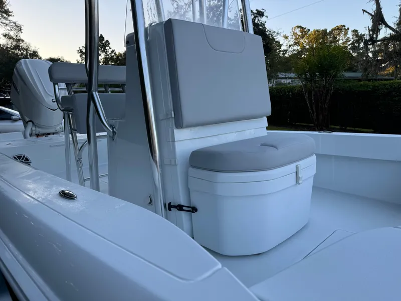 Slide: The Image of 2024 Contender 23 Bay boat interior with cushioned seating and sleek design. - 13