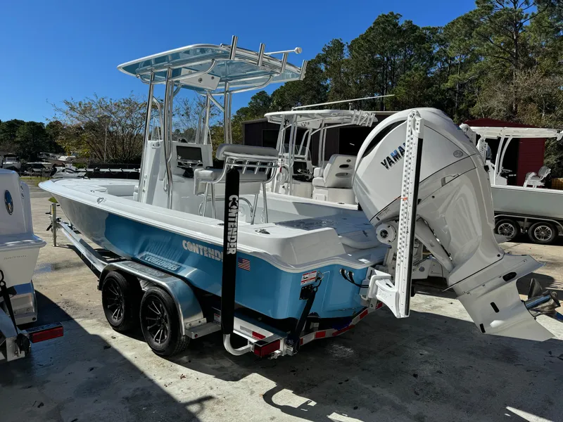 Slide: The Image of 2024 Contender 23 Bay boat with Yamaha engine on trailer. - 20