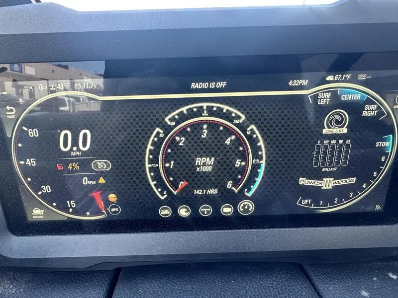 Slide: The Image of Dashboard of a 2023 Malibu 26 LSV boat showing RPM, speed, and surf settings. - 18