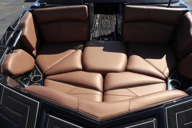 Slide: The Image of 2020 Centurion Fi23 boat interior with brown leather seating. - 16