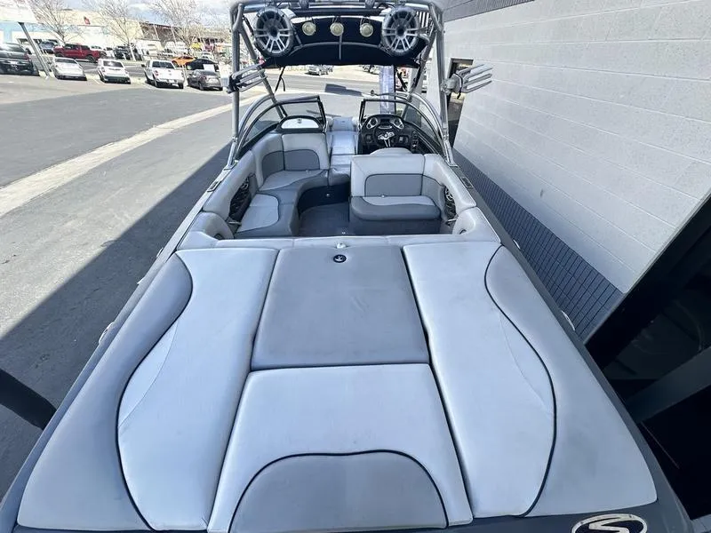 Slide: The Image of 2010 Supra Launch 24V Worlds Edition boat interior with seating and sound system. - 10