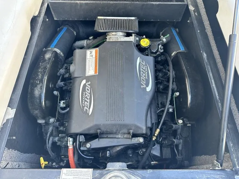 Slide: The Image of 2010 Supra Launch 24V Worlds Edition Vortec engine in boat compartment. - 11