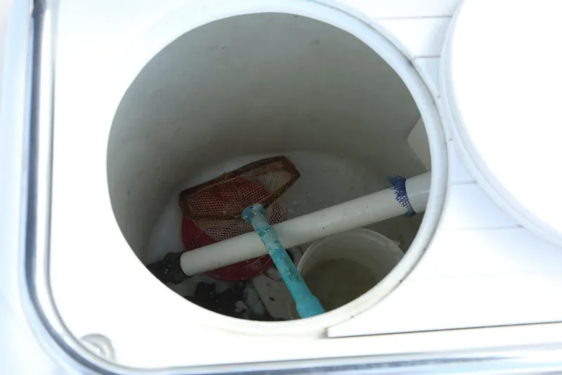 Slide: The Image of Livewell compartment on a 2004 Sea Ray 290 Amberjack boat. - 10