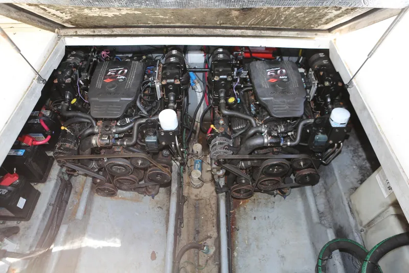 Slide: The Image of 2004 Sea Ray 290 Amberjack engine compartment with twin engines - 37