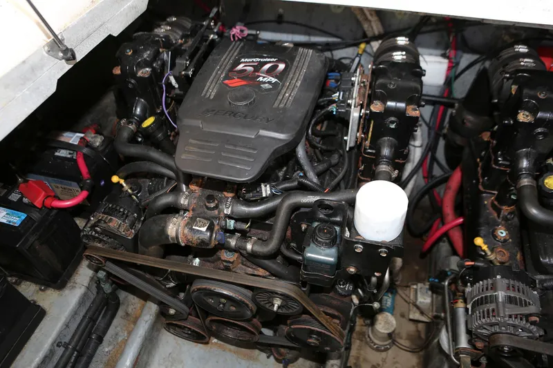 Slide: The Image of Engine compartment of a 2004 Sea Ray 290 Amberjack boat. - 38