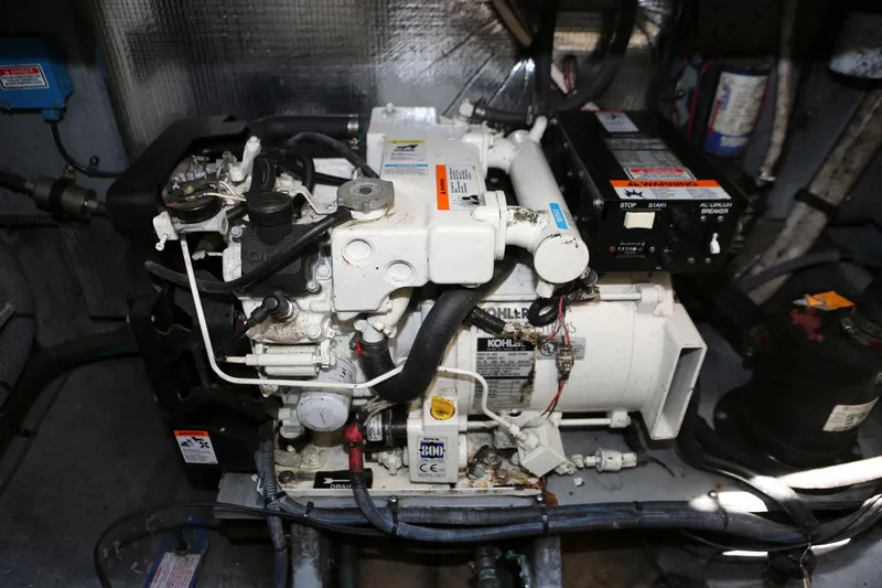 Slide: The Image of Engine compartment of a 2004 Sea Ray 290 Amberjack boat. - 40
