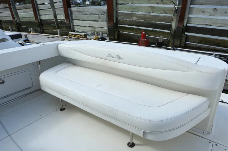 Slide: The Image of White seating area on 2004 Sea Ray 290 Amberjack boat. - 5