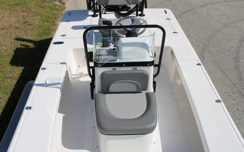 Slide: The Image of 2024 Spyder FX19 Vapor boat interior with center console and seating. - 12