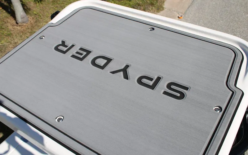 Slide: The Image of 2024 Spyder FX19 Vapor boat deck with logo. - 7