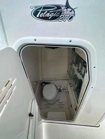 Slide: The Image of 2024 Pioneer 270 Pelagic boat interior with marine toilet. - 10