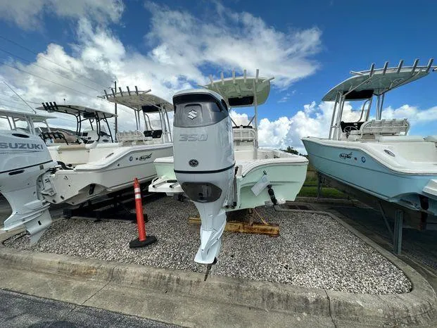 Slide: The Image of 2024 Avenger 26 Avenger boat with Suzuki 350 outboard motor on display. - 3
