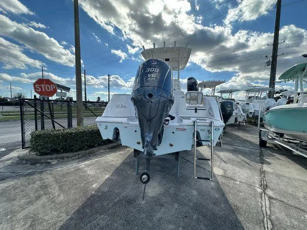 Slide: The Image of 2024 Sea Fox 248 Commander boat with 300 V6 engine, rear view. - 3