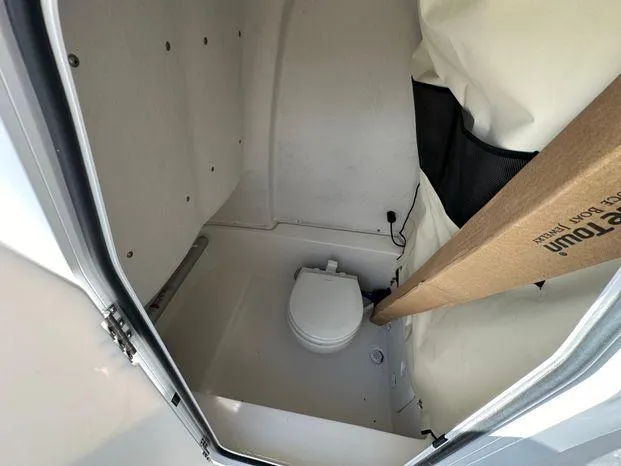 Slide: The Image of 2024 Sea Fox 248 Commander boat interior with toilet. - 7