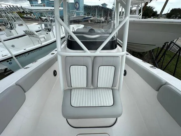 Slide: The Image of 2024 Sea Fox 248 Commander boat interior with cushioned seating. - 5