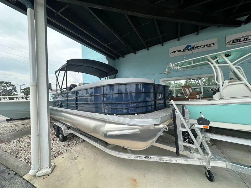 Slide: The Image of 2022 Veranda VISTA VIEW 22RC pontoon boat on trailer in showroom. - 1