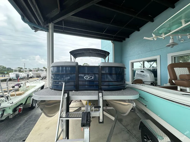 Slide: The Image of 2022 Veranda VISTA VIEW 22RC pontoon boat displayed in a showroom. - 3