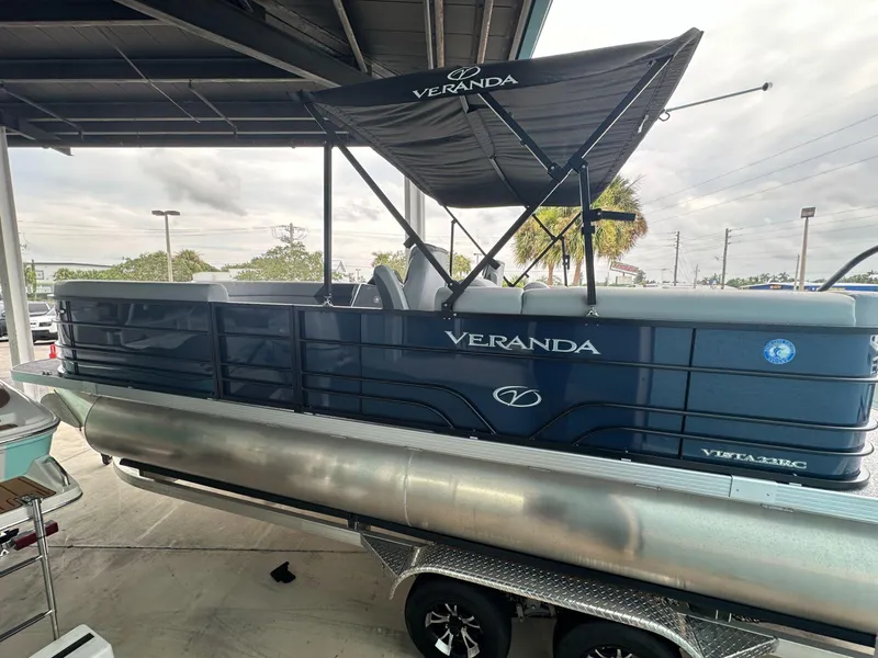 Slide: The Image of 2022 Veranda VISTA VIEW 22RC pontoon boat under a canopy. - 5