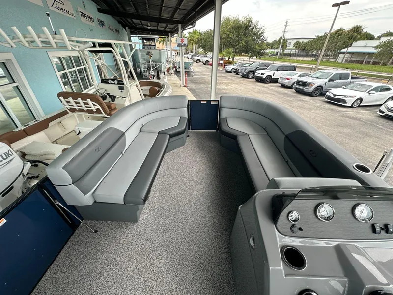 Slide: The Image of 2022 Veranda VISTA VIEW 22RC pontoon boat with spacious seating and modern dashboard. - 7