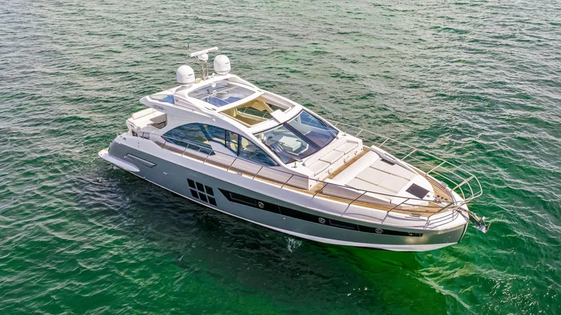 Slide: The Image of 2016 Azimut 55S luxury yacht cruising on open water. - 17