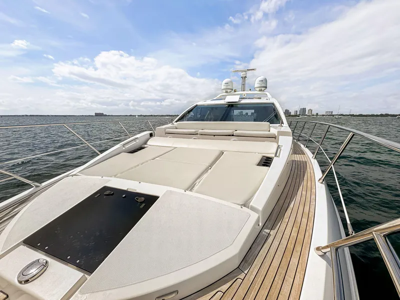 Slide: The Image of 2016 Azimut 55S yacht with spacious sun deck on open water. - 22