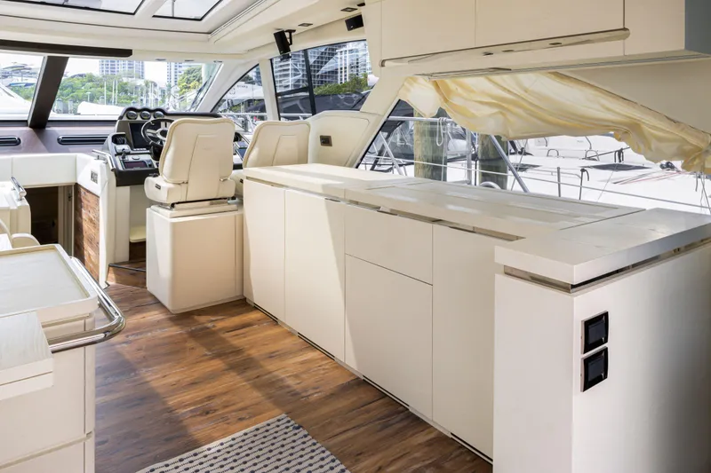 Slide: The Image of Interior of 2016 Azimut 55S yacht with modern design and wooden flooring. - 29