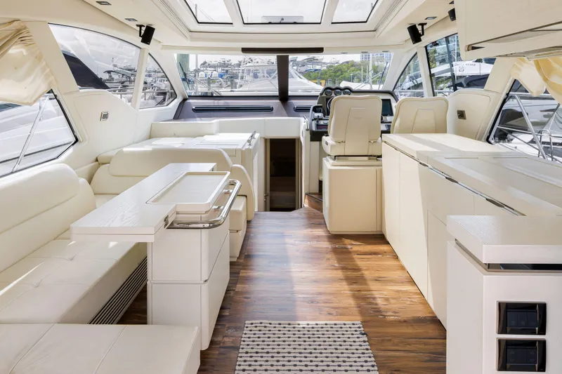 Slide: The Image of Luxurious interior of 2016 Azimut 55S yacht with modern furnishings and panoramic windows. - 30