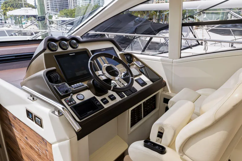 Slide: The Image of Helm station of a 2016 Azimut 55S yacht with modern navigation equipment. - 36