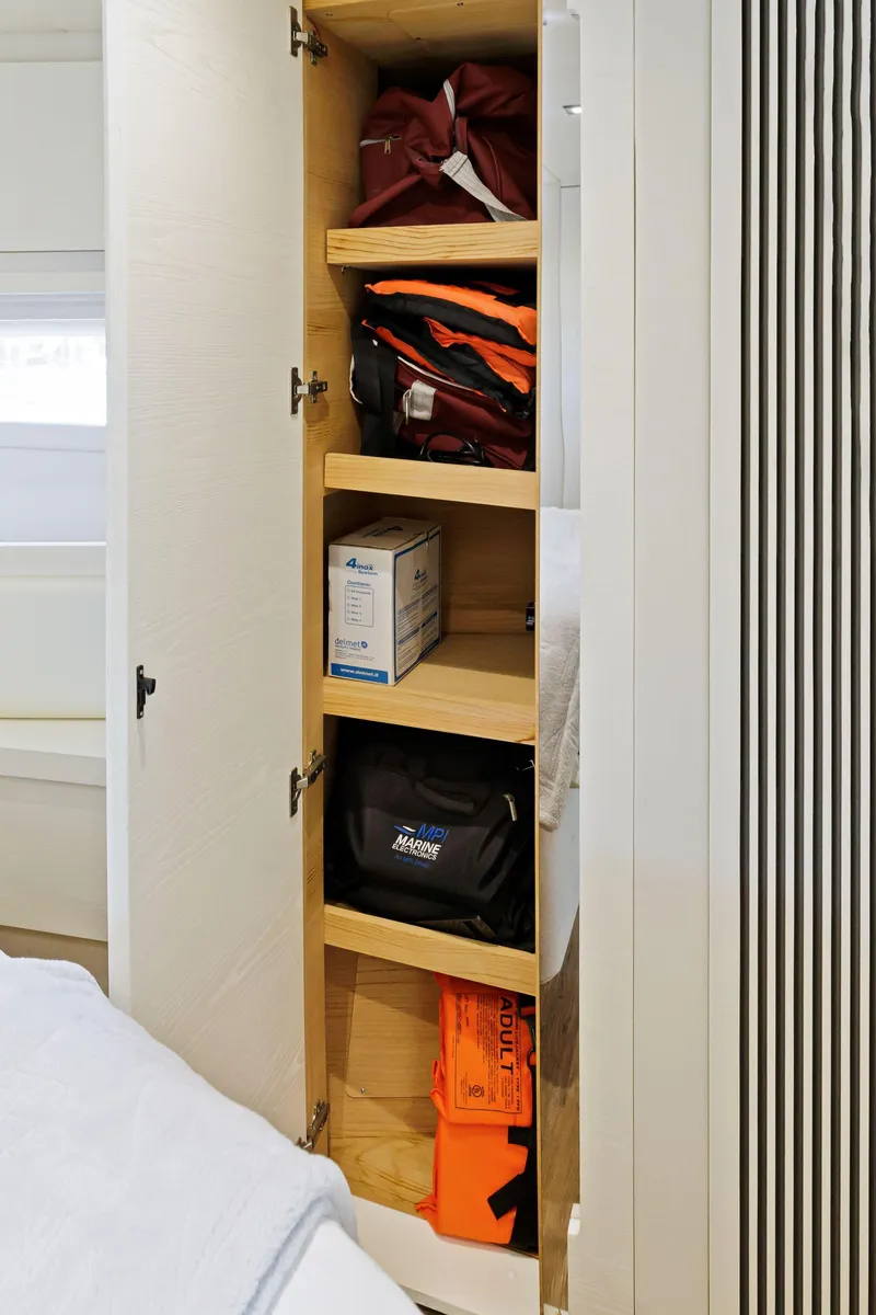 Slide: The Image of Storage cabinet with shelves on a 2016 Azimut 55S yacht. - 49