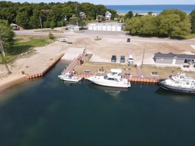 Slide: The Image of Aerial view of 1987 Sea Ray 460 Convertible docked at a marina. - 23